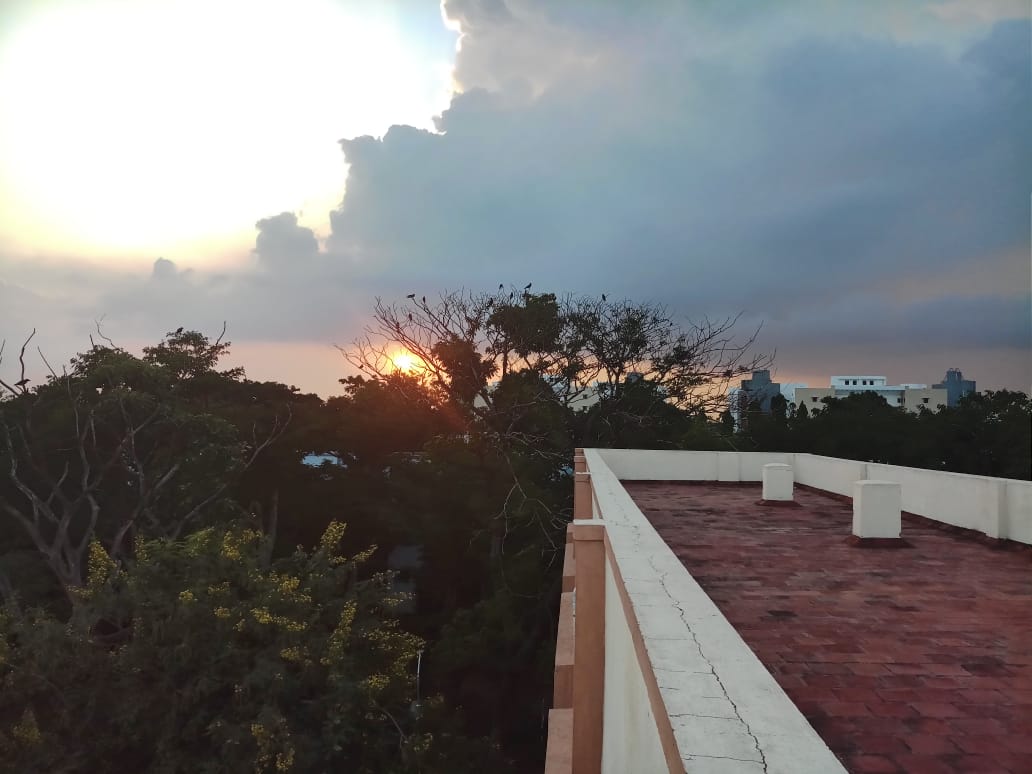 Sunrise and sunset from Narmad rooftop