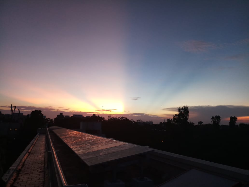 Sunrise and sunset from Narmad rooftop